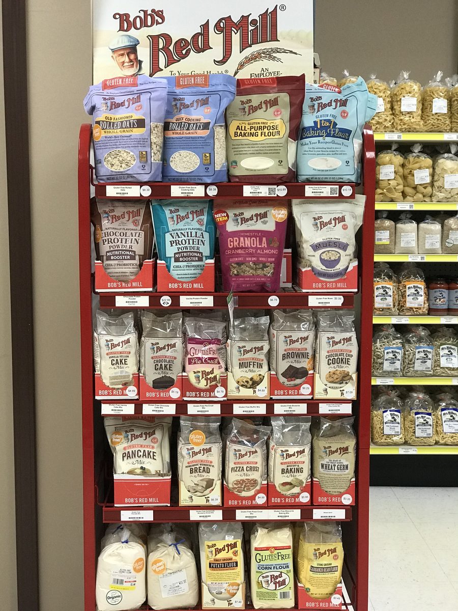 Baking aisle at Lantz's with a gluten-free display and bulk flours and noodles